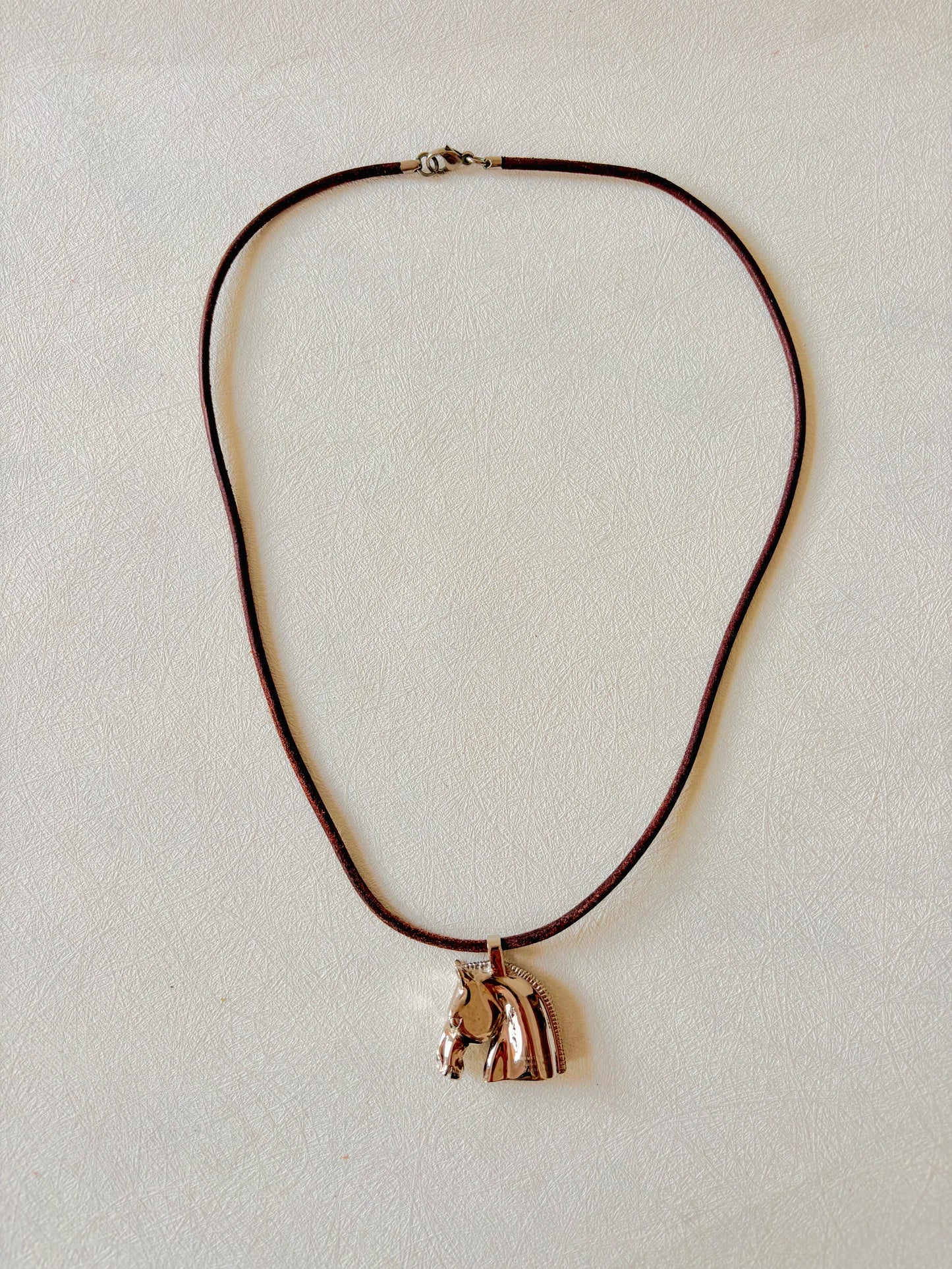 HERMÈS Pendentif Cheval