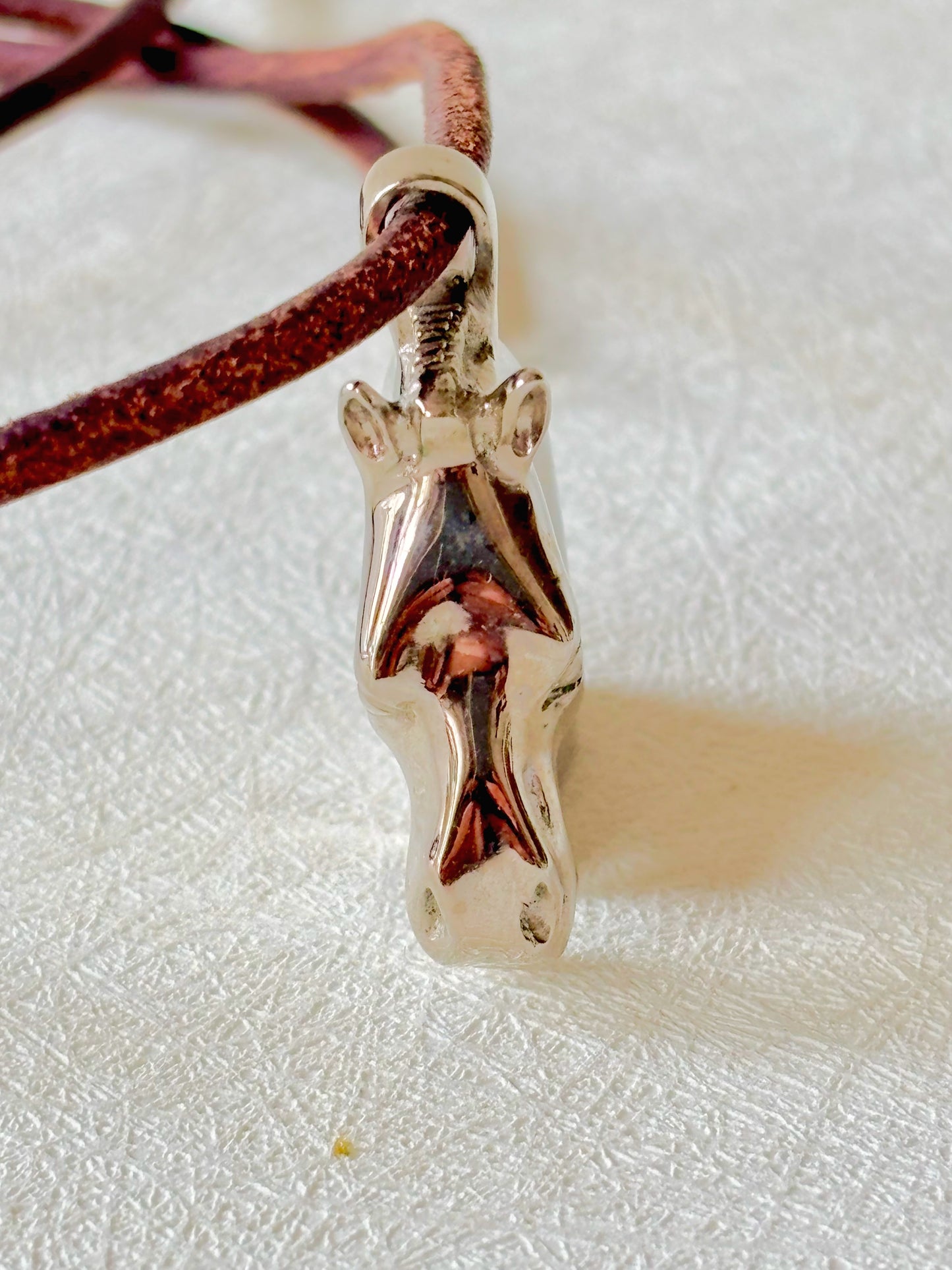 HERMÈS Pendentif Cheval