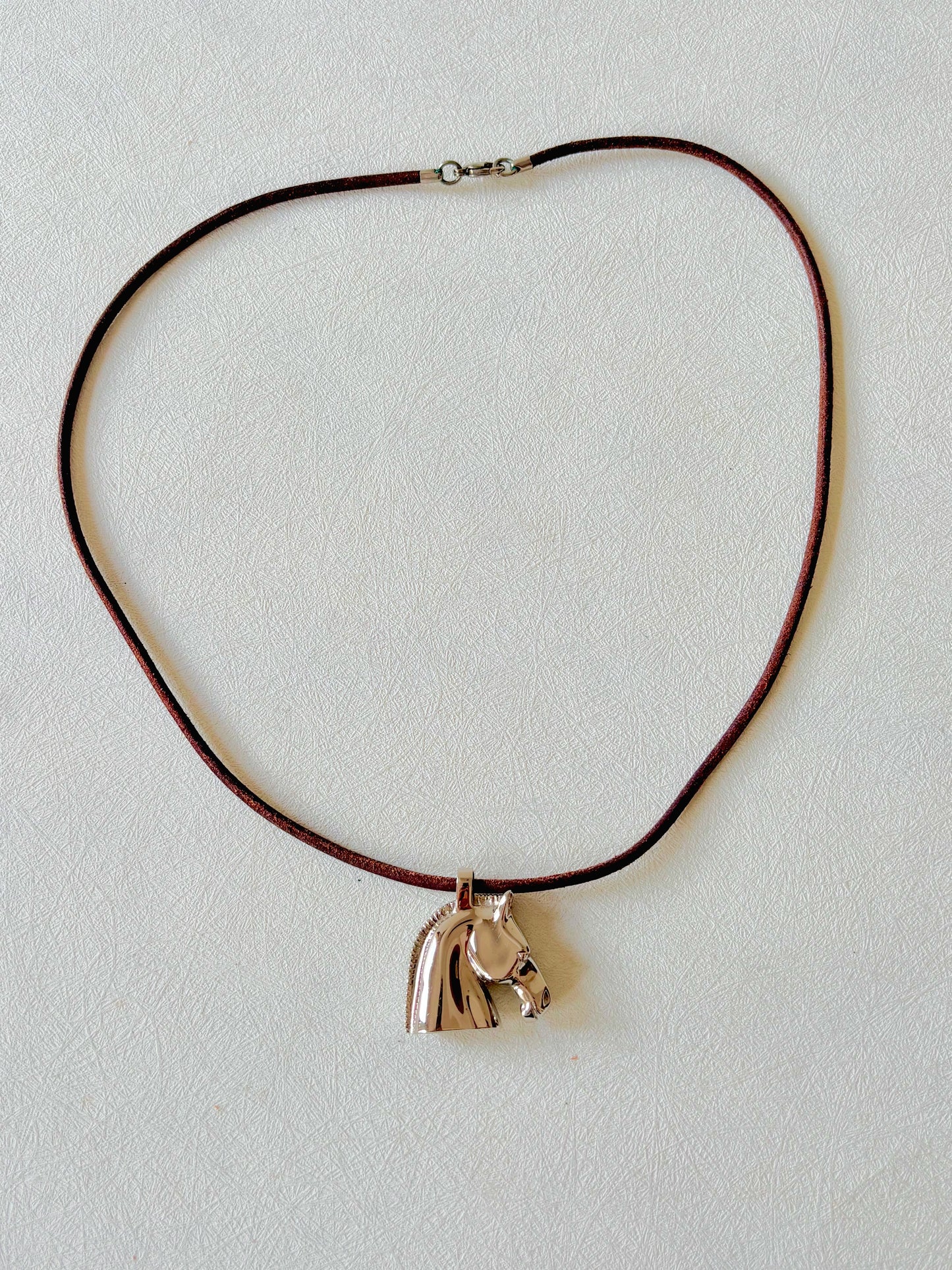 HERMÈS Pendentif Cheval