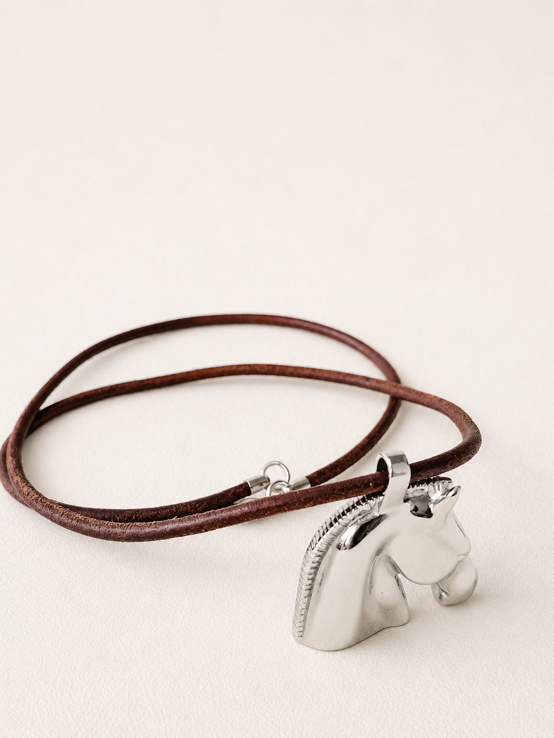 HERMÈS Pendentif Cheval
