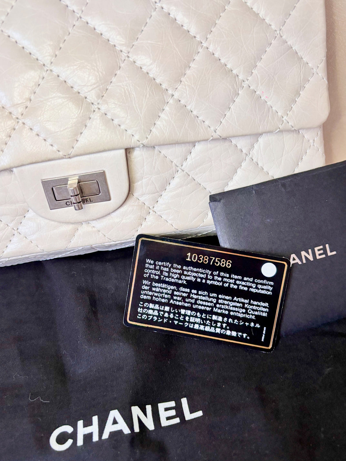 CHANEL Sac 2.55 Cuir blanc