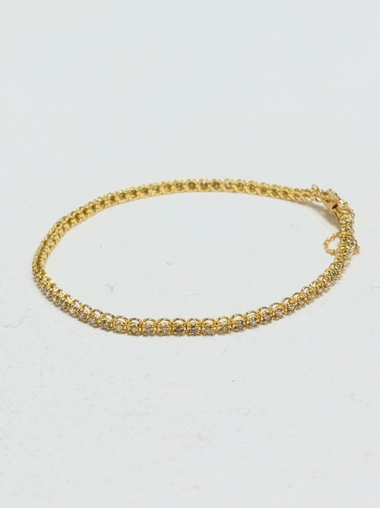 Bracciale tennis in oro e diamanti