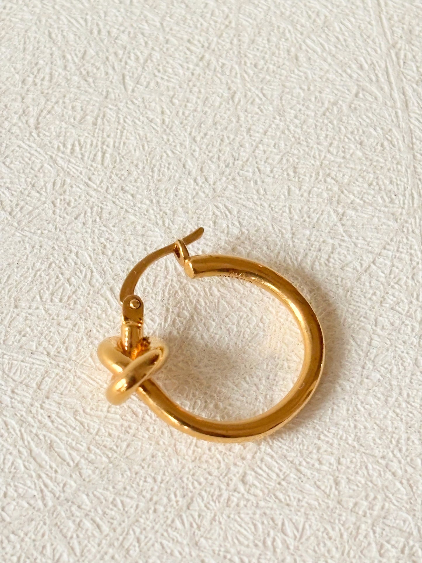 CÉLINE Boucle d'oreille Knot solitaire