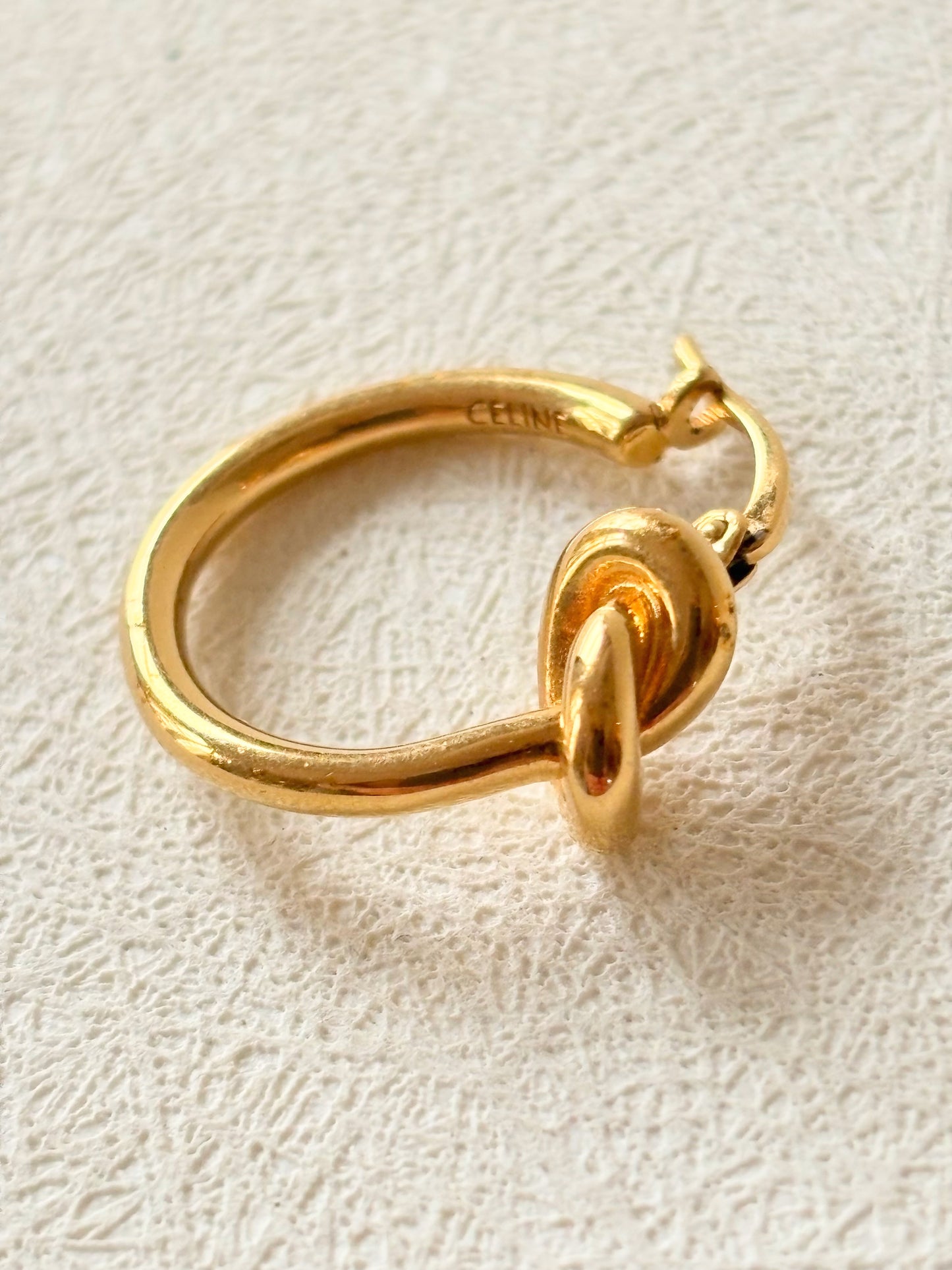 CÉLINE Boucle d'oreille Knot solitaire