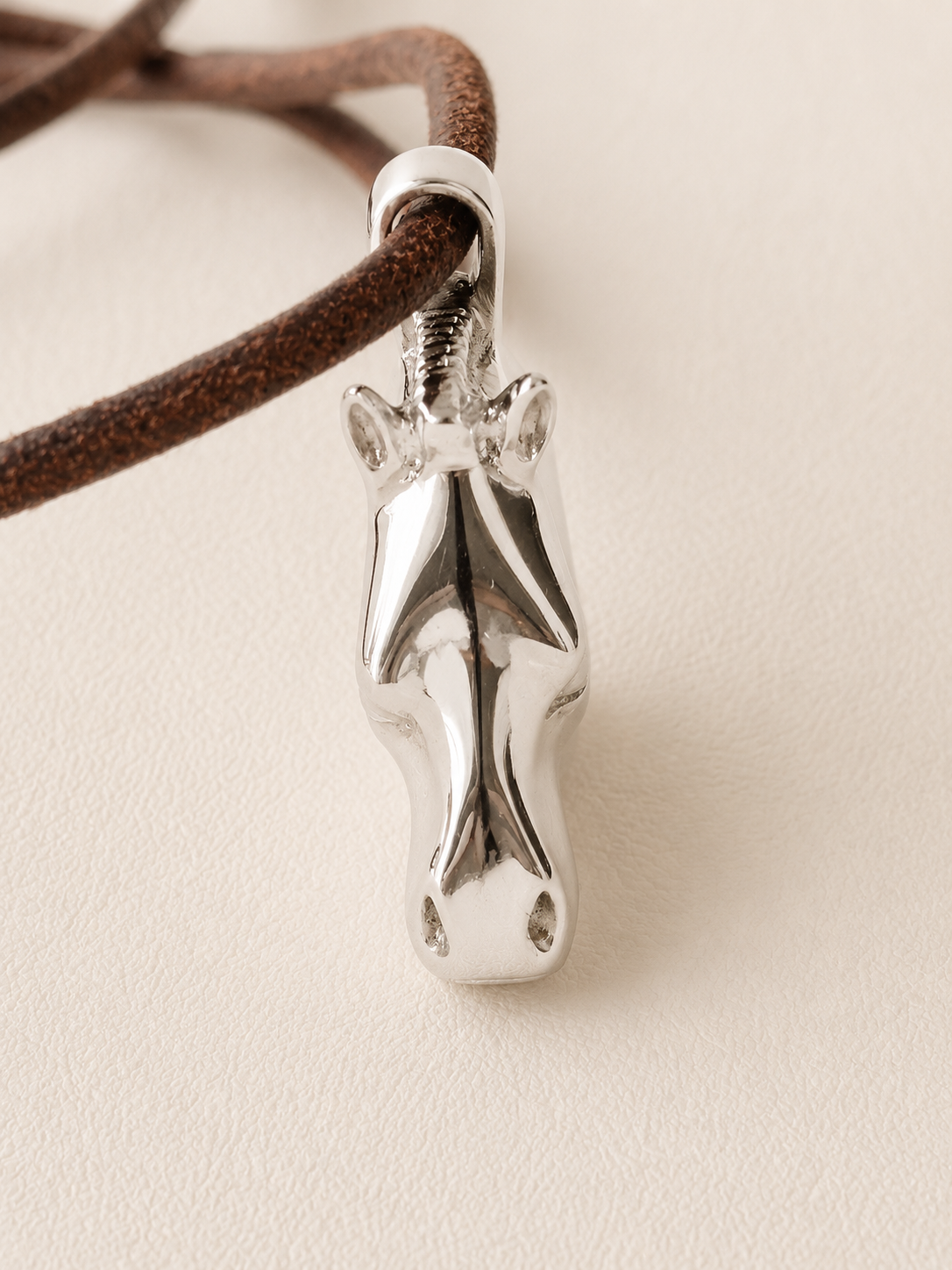 HERMÈS Pendentif Cheval