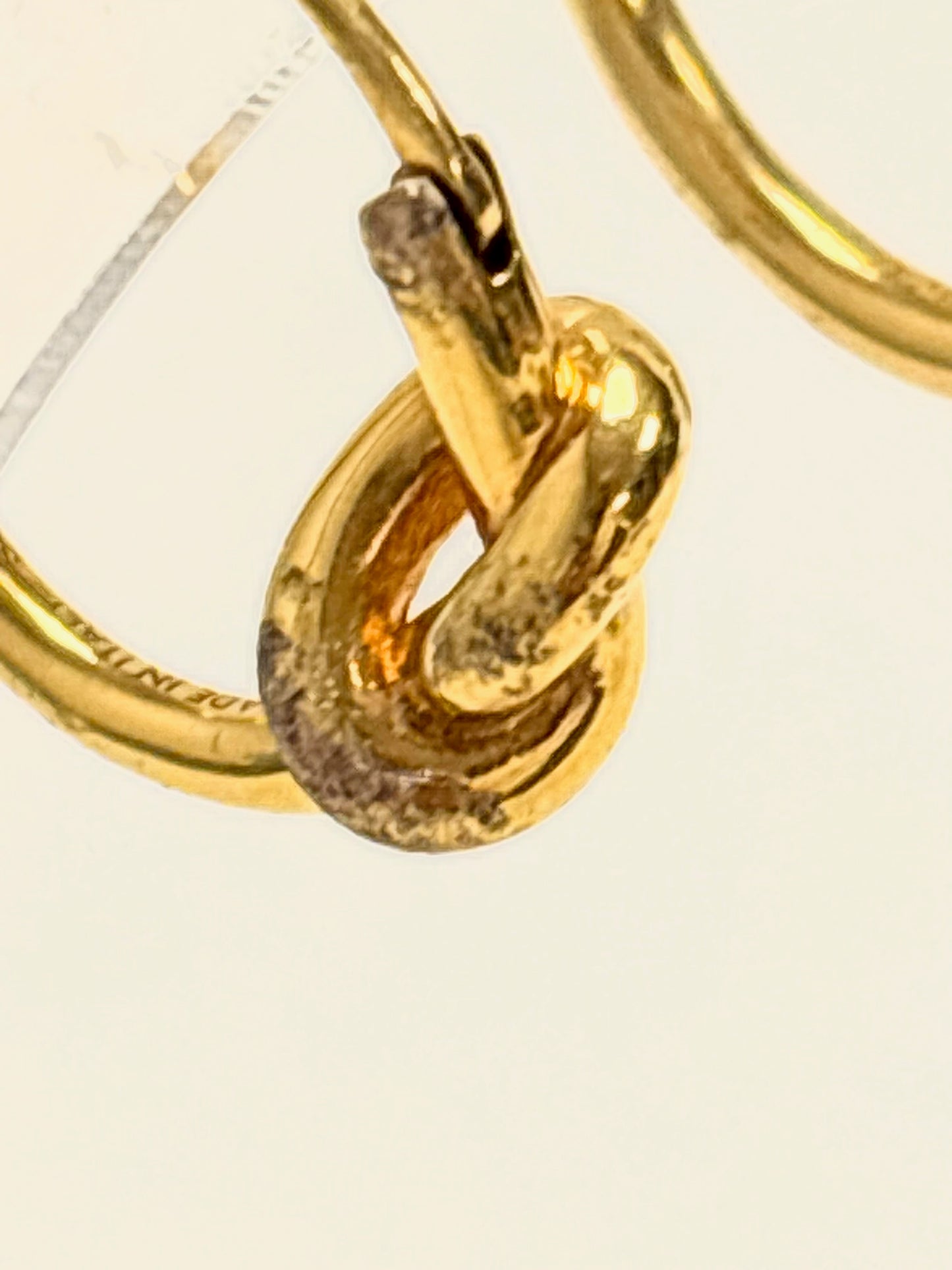 CÉLINE Knot solitaire earring