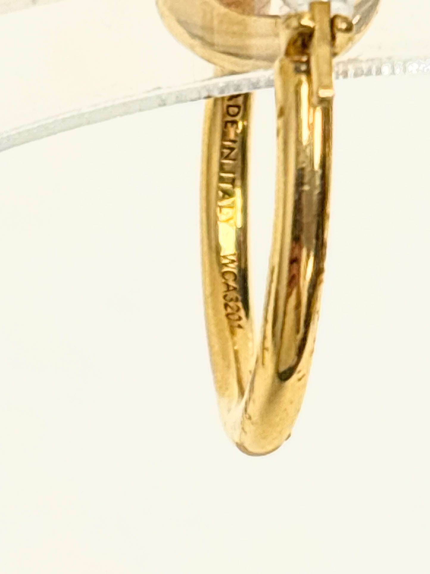 CÉLINE Knot solitaire earring