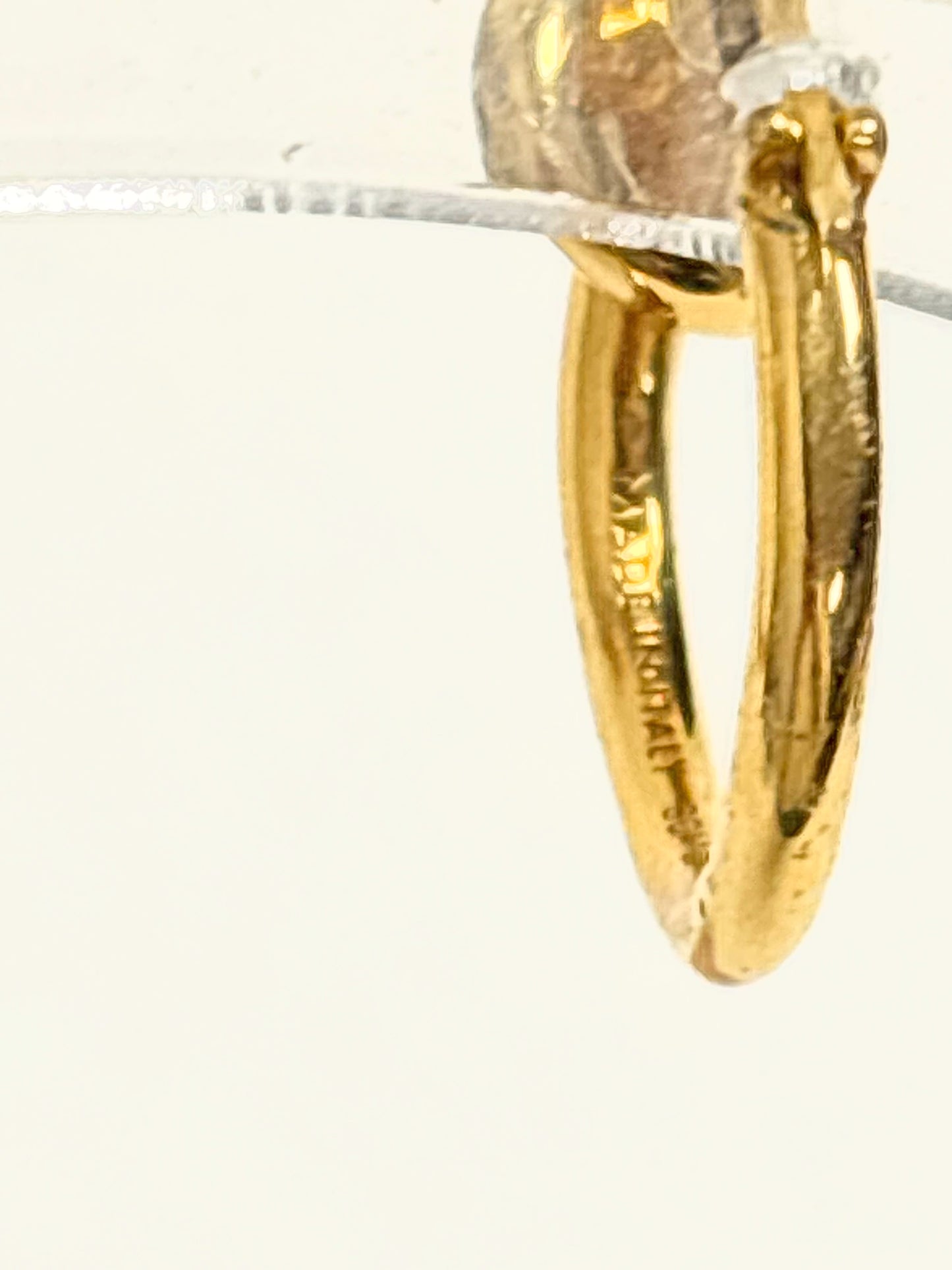 CÉLINE Knot solitaire earring