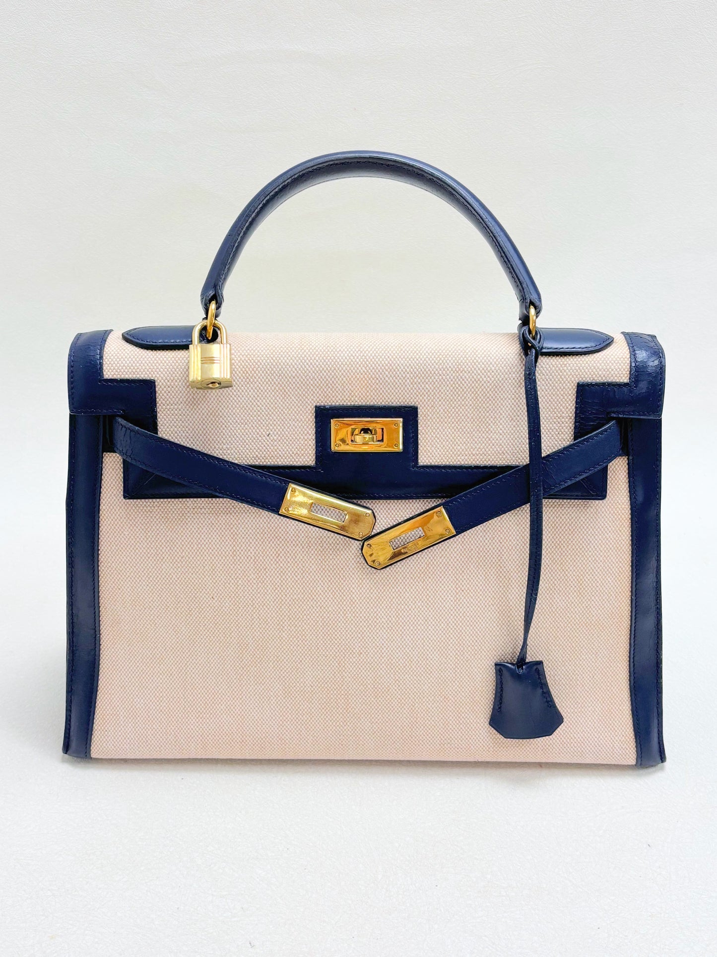 HERMÈS Sac Kelly Sellier 32 Box et Toile H