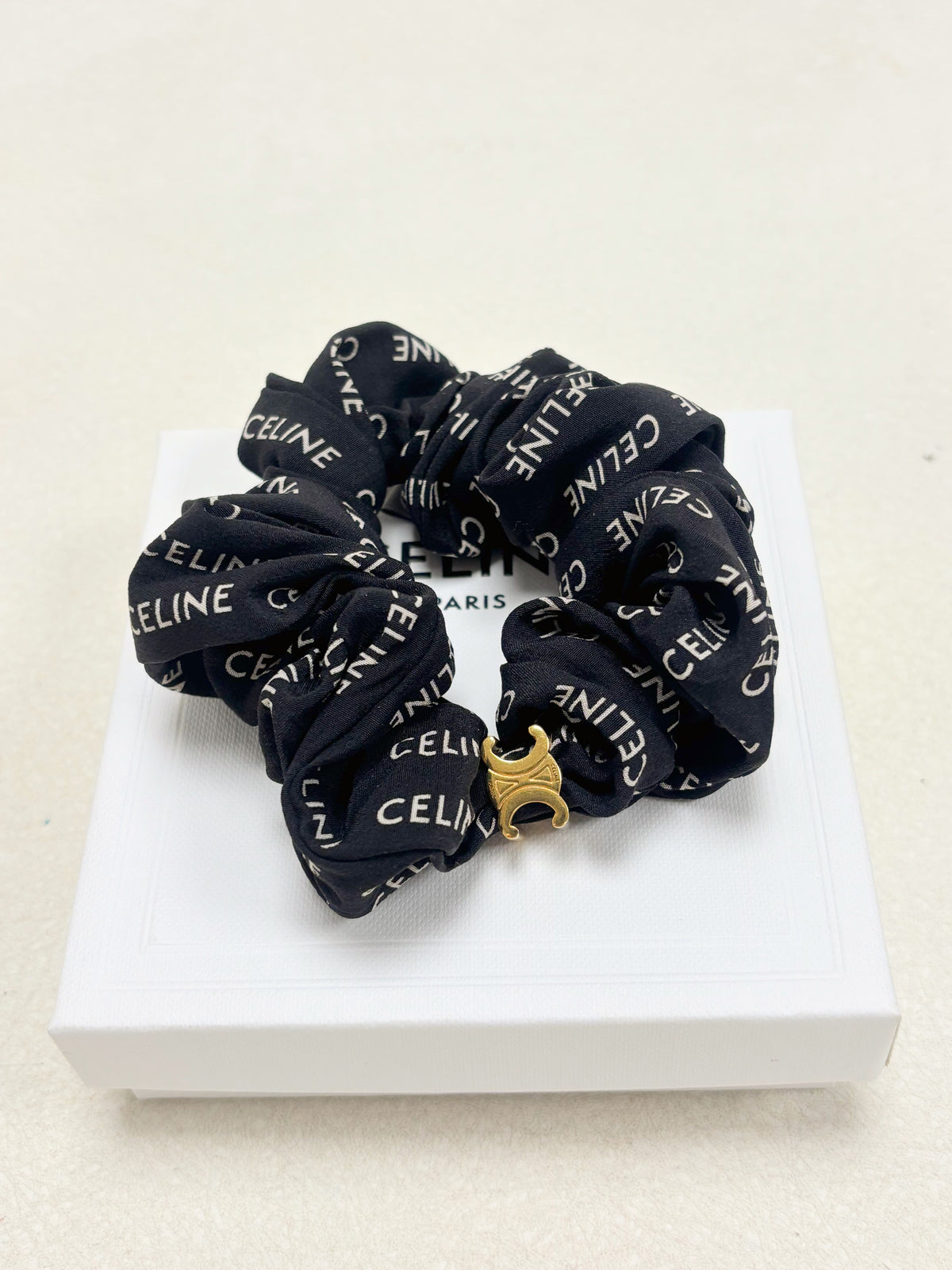 CELINE Chouchou Triomphe