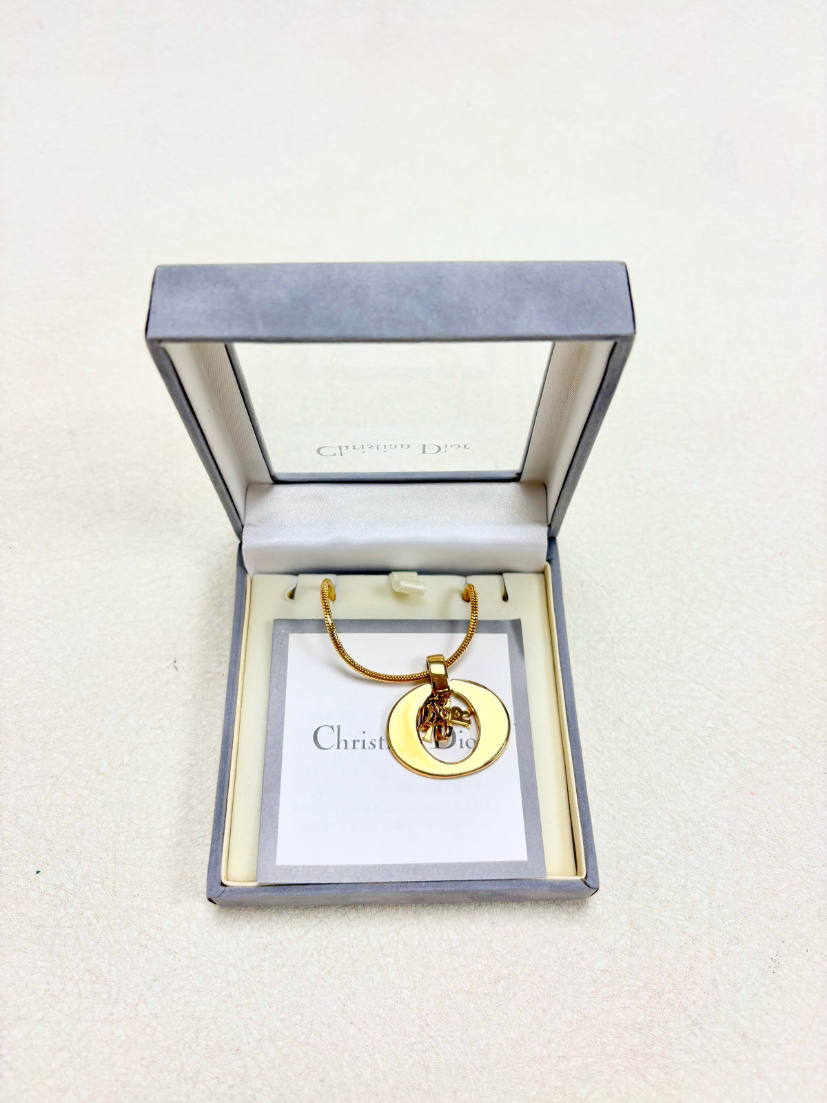 DIOR Collier Logo