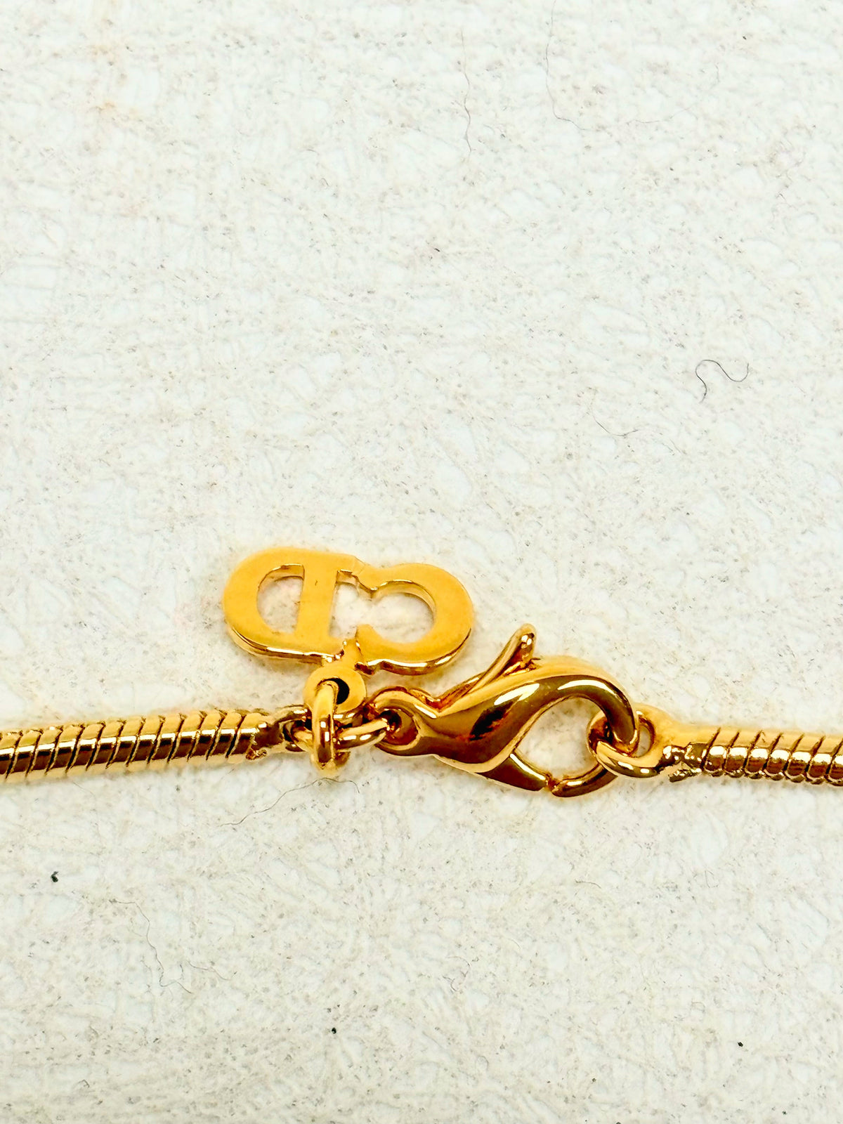 DIOR Collier Logo