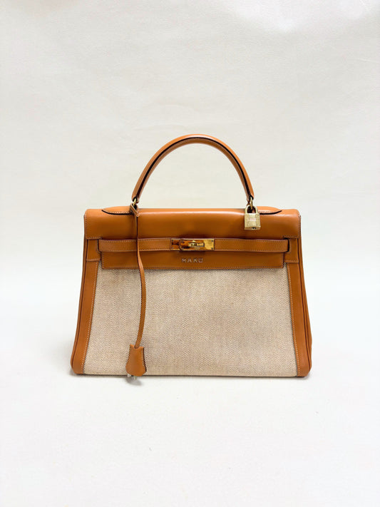 HERMÈS Sac Kelly Retourné 32 Toile H et Box