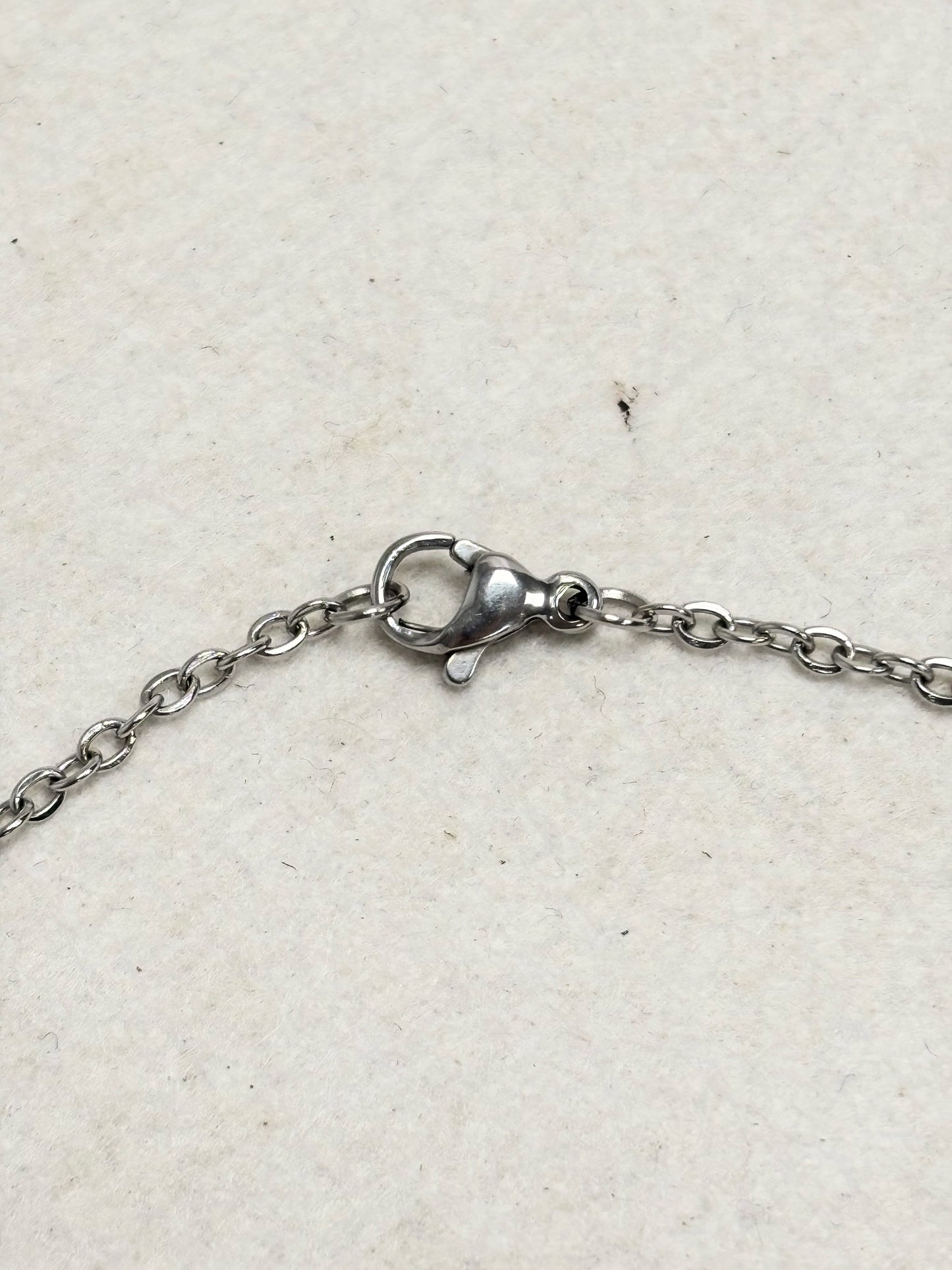 DIOR Collier Logo