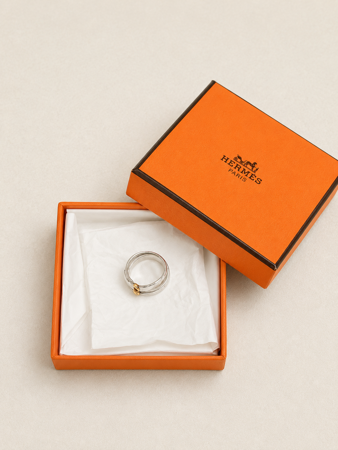 HERMÈS Bague Débridée Argent et Or