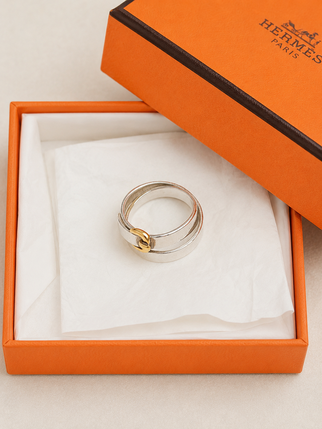 HERMÈS Bague Débridée Argent et Or