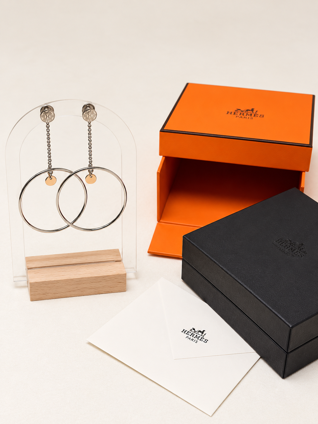 HERMÈS Boucles d'oreilles Ex-Libris